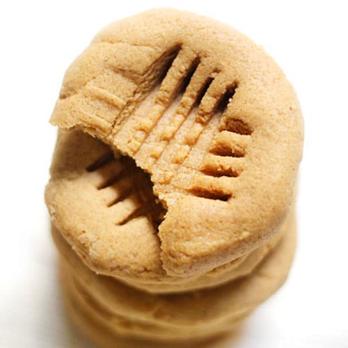 An overhead view of a vertical stack of 3 ingredient old fashioned peanut butter cookies