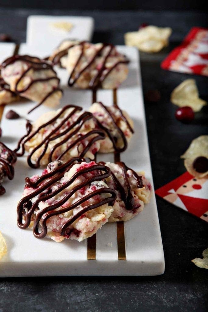 Cranberry Chocolate Potato Chip Cookies are served on a marble platter