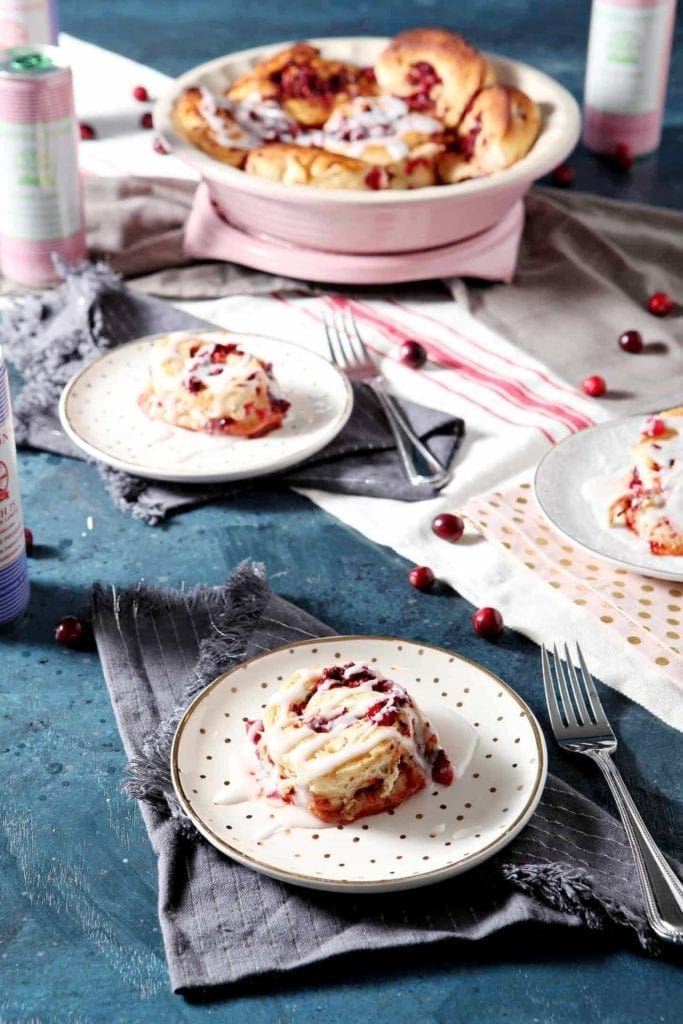 cranberry cinnamon rolls on small plates