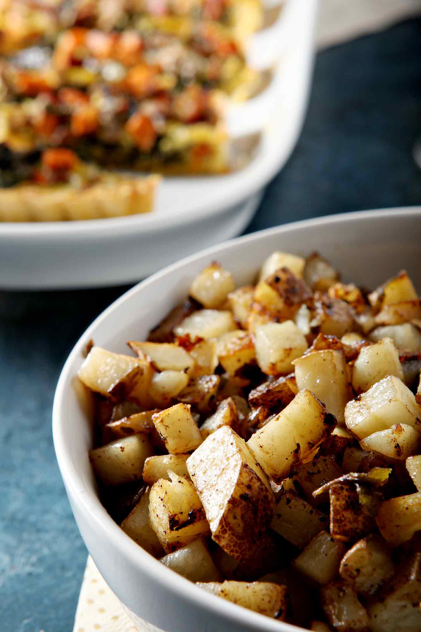 home fries in a white bowl