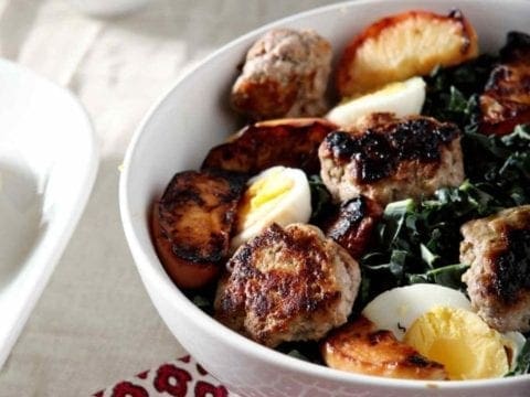 A bowl of Thanksgiving brunch salad on a tabletop