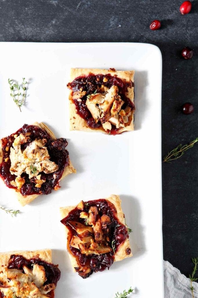 cranberry turkey tartlets on a white plate