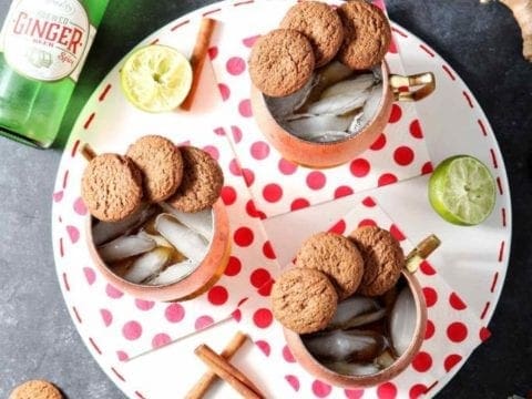 three gingerbread mules on a plate with polka dot napkins