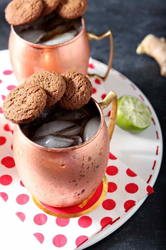 two gingerbread mules in copper mugs