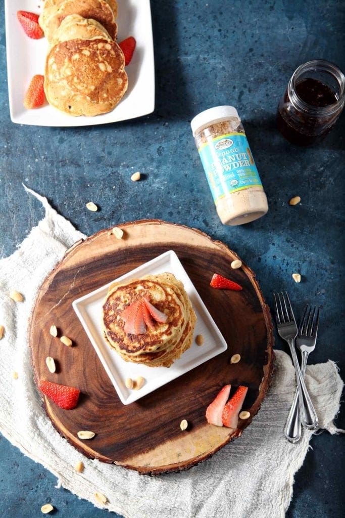 peanut butter pancakes on a white plate 