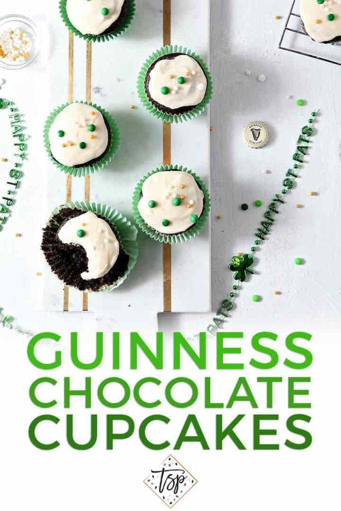 Overhead image of several decorated Chocolate Guinness Cupcakes with Pinterest text