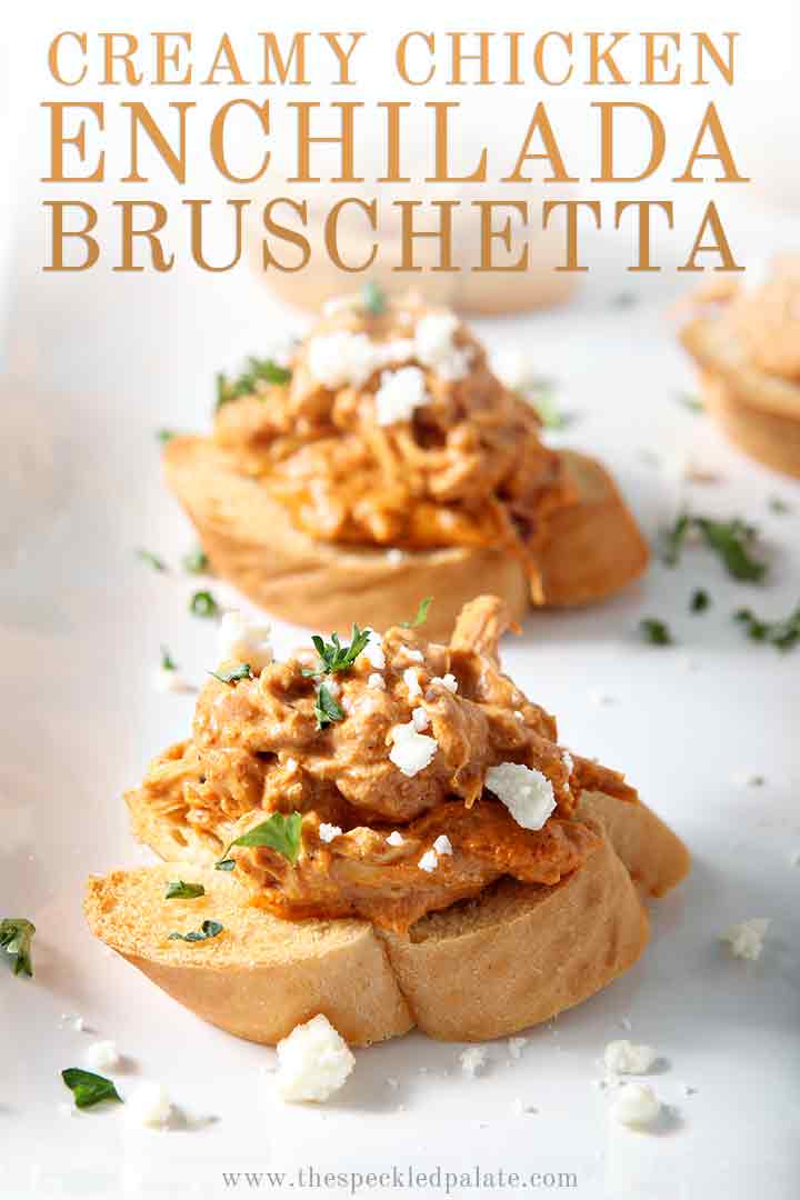 Close up of Chicken Enchilada Bruschetta on a platter with Pinterest text