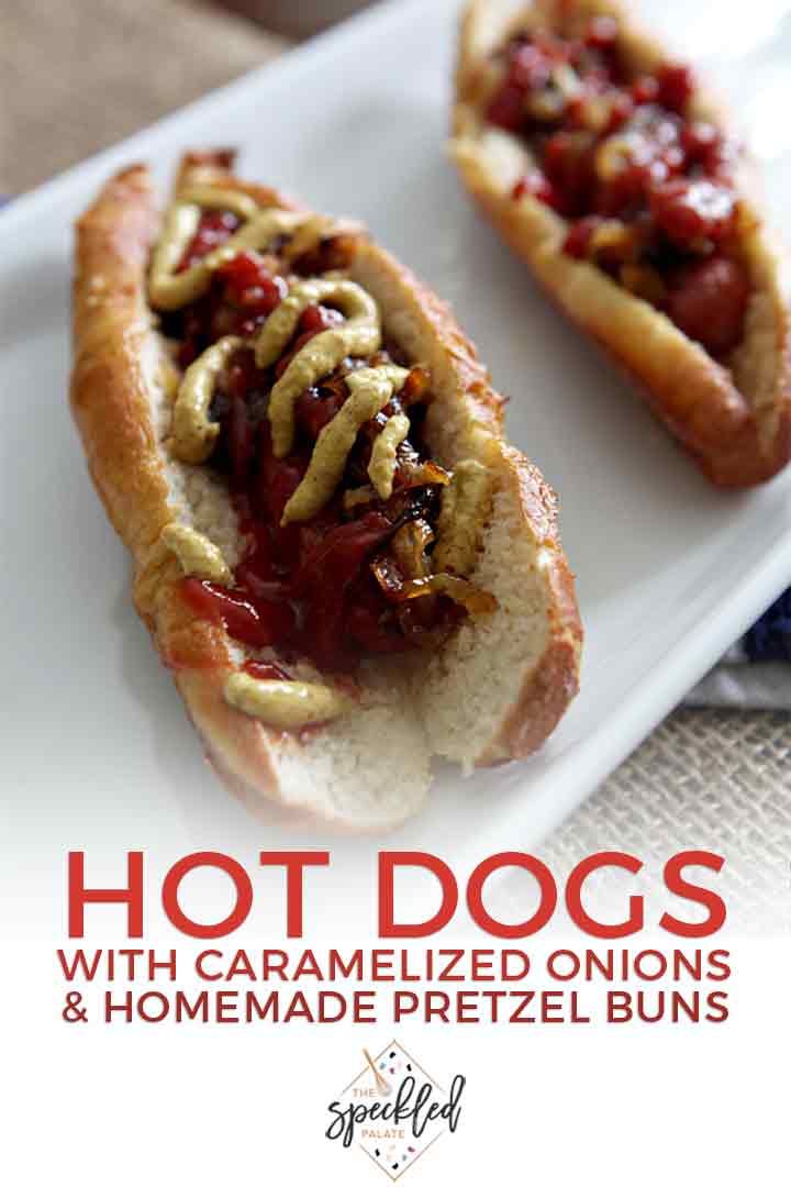 Close up of two hot dogs on homemade pretzel buns, with Pinterest text