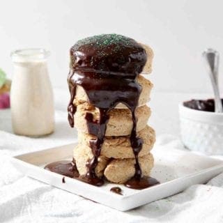 A stack of biscuits covered in a chocolate glaze