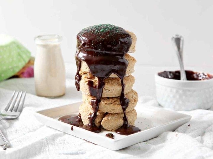 A stack of biscuits covered in a chocolate glaze