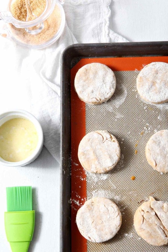 Unbaked cream biscuits on a baking sheet