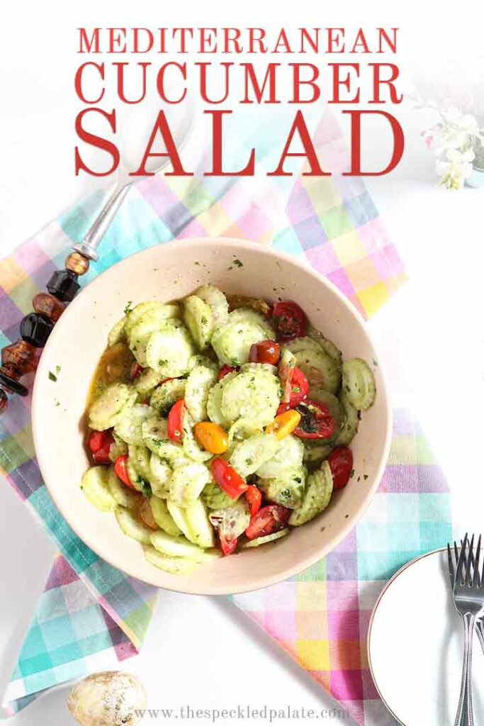 Overhead image of Mediterranean Cucumber Salad with Heirloom Tomatoes and Lemon Vinaigrette, with Pinterest text