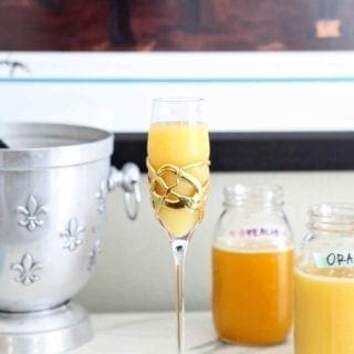 A traditional mimosa sits on the mimosa bar before drinking