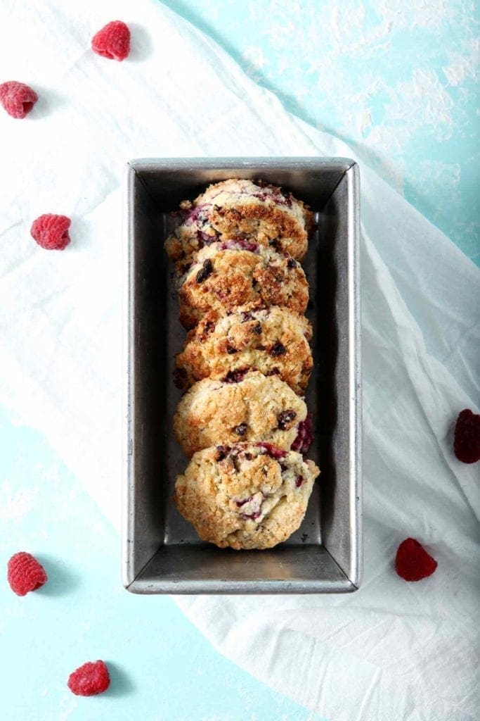 Several raspberry biscuits in a metal tray