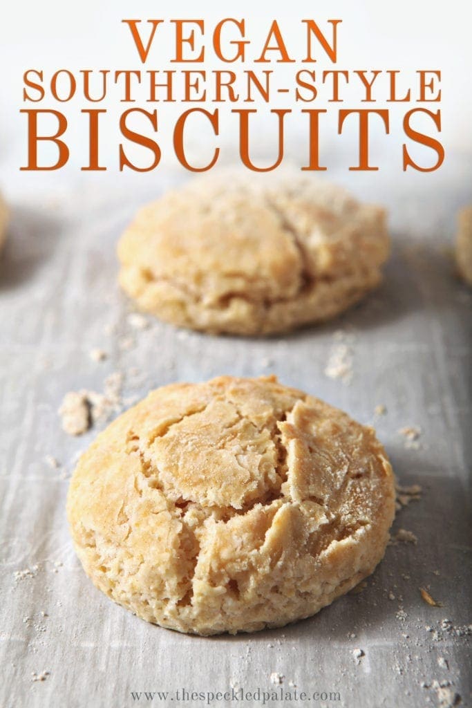 Vegan biscuits line a baking sheet after baking, with Pinterest text