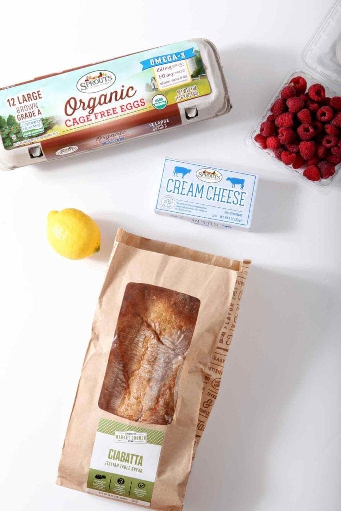 Overhead image of Chocolate Raspberry Overnight French Toast Casserole ingredients on a white background