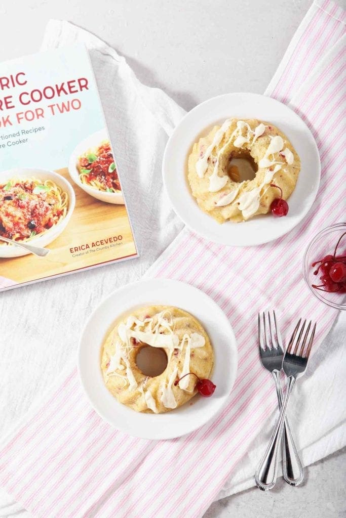 white chocolate bundt cakes on white plates