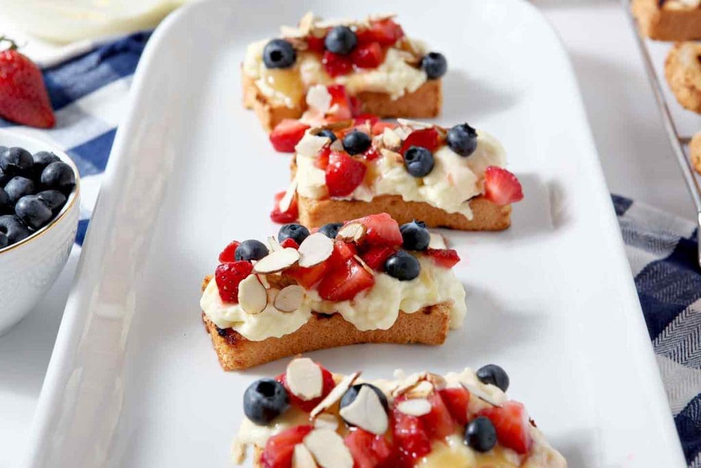 Slices of Strawberry Bruschetta on a white platter