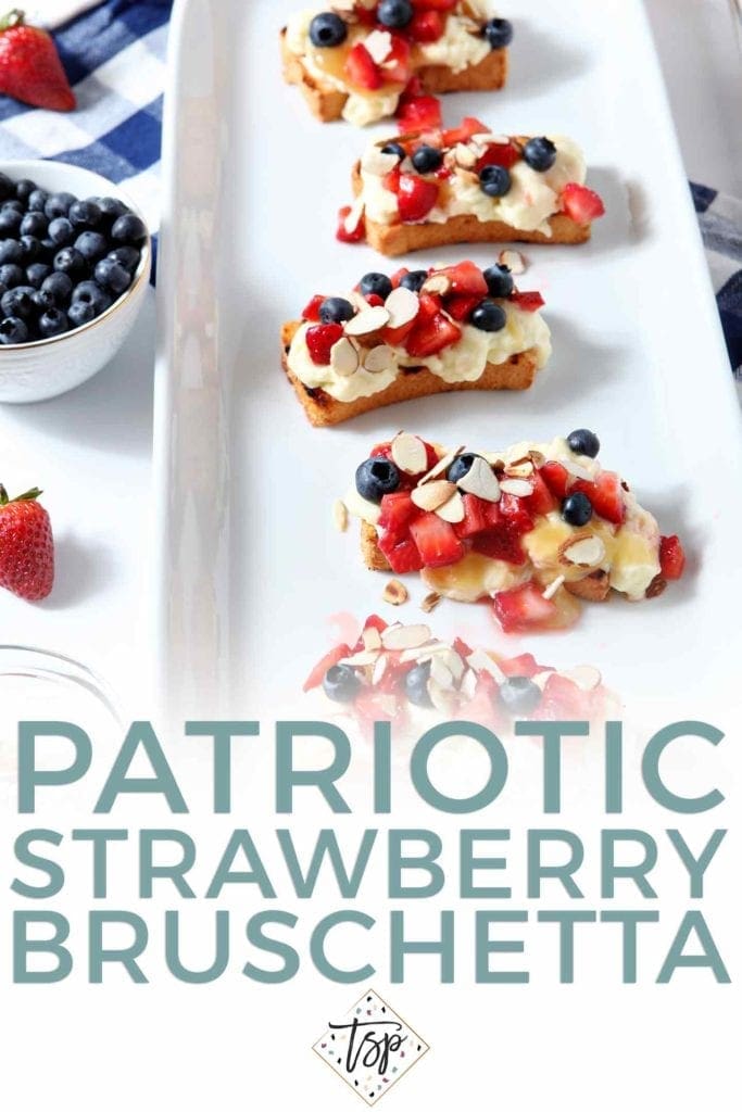 Pinterest graphic for Patriotic Strawberry Bruschetta, showing the final bruschetta on a white platter, surrounded by strawberries and blueberries