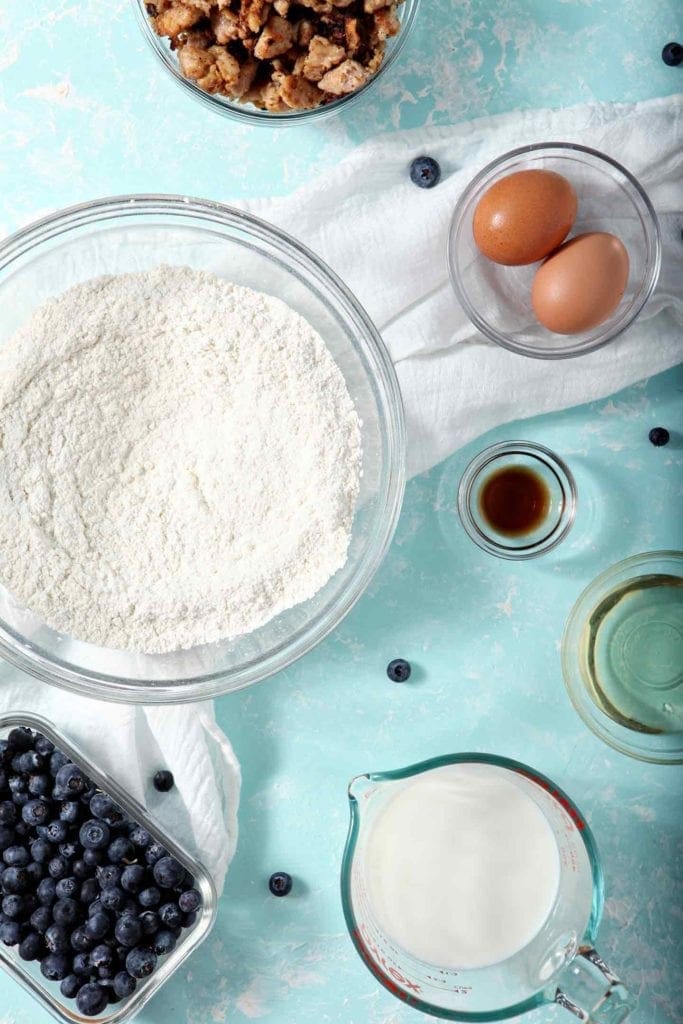 Ingredients for blueberry sausage pancakes in bowls