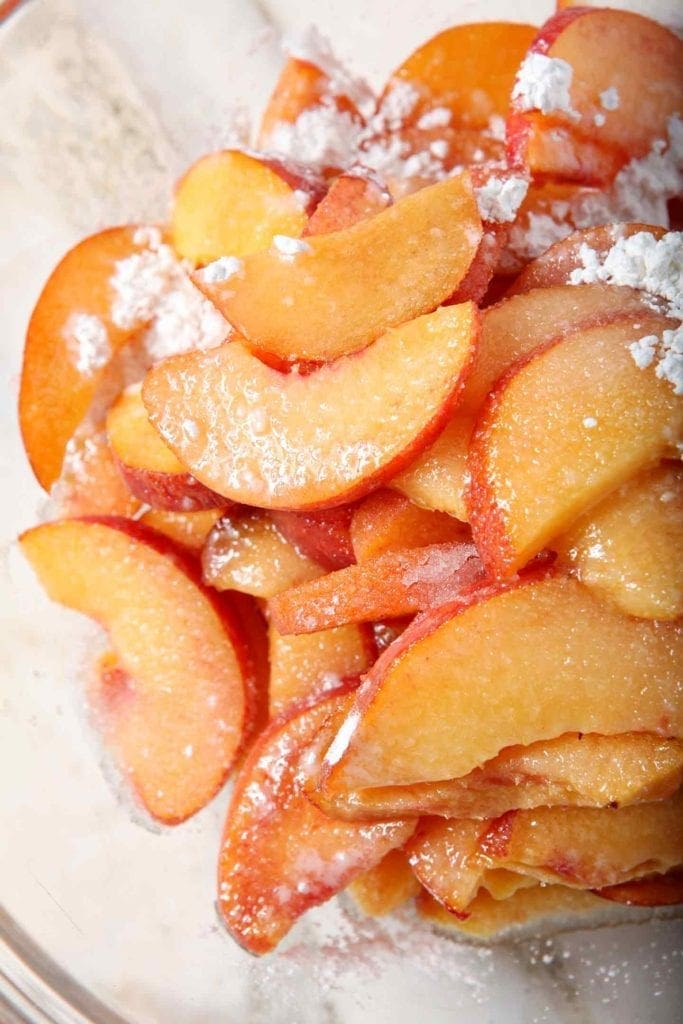 Peaches in corn starch and sugar as the base of Dairy Free Peach Cobbler