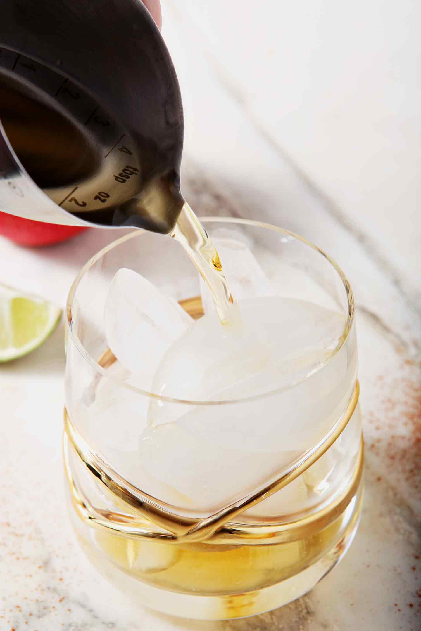 Apple cider pours into a glass