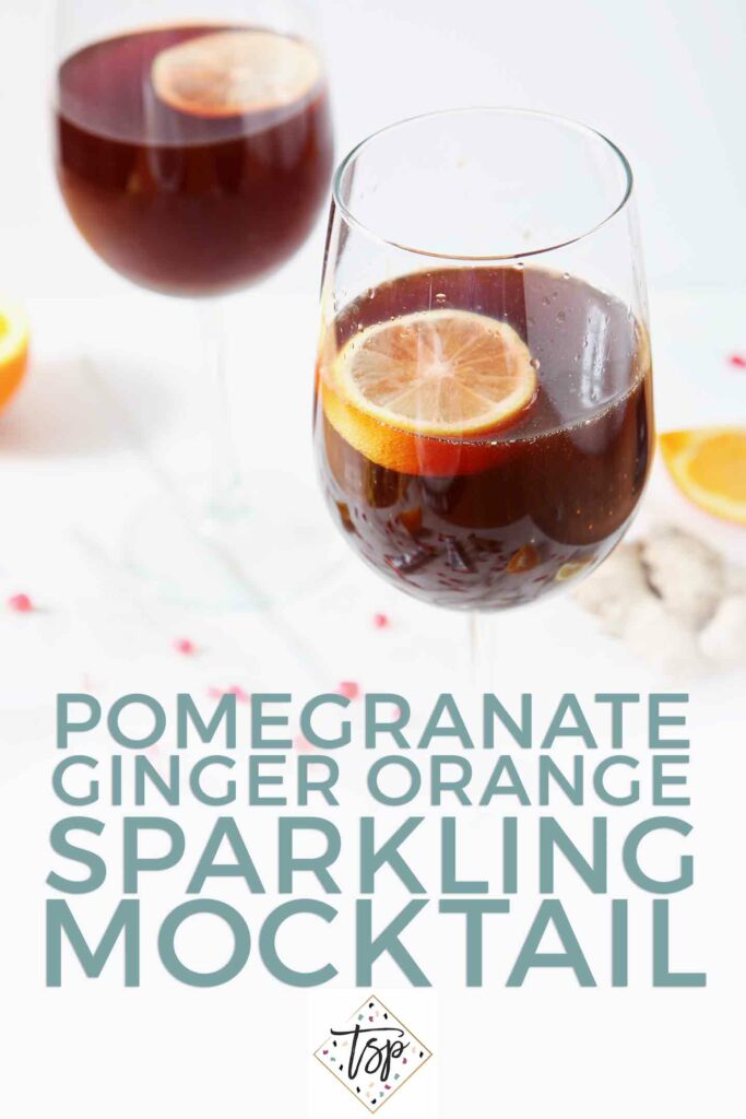 Pinterest image for Pomegranate Ginger Orange Sparkling Mocktail, featuring a close up of two of the mocktails and Pinterest text