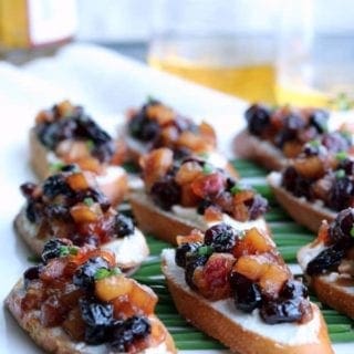 Close up of Apple Chutney Bruschetta, an easy fall appetizer to make for a crowd or an at-home date night