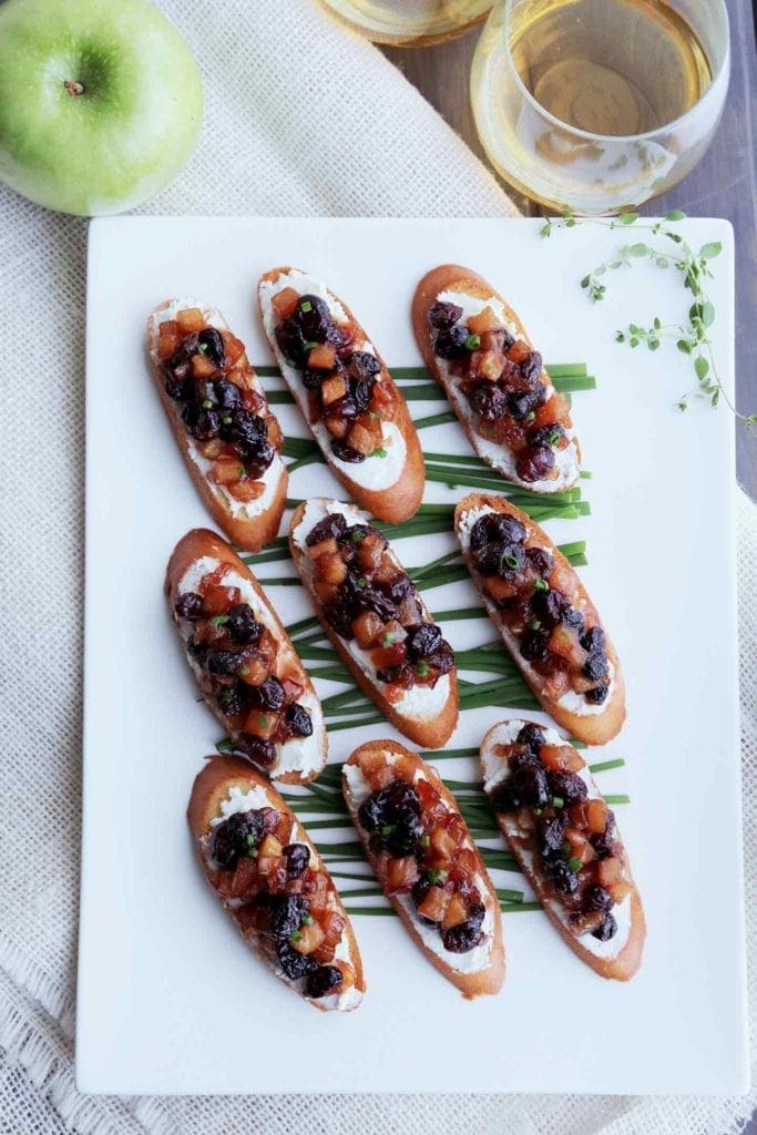 Overhead image of Apple Chutney Bruschetta, served on a white platter