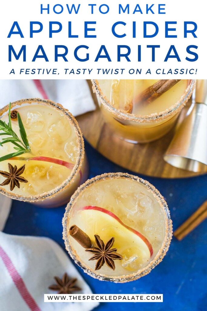 Three Apple Cider Margaritas from above garnished with cinnamon sticks, apple rounds and star anise on a blue background with the text 'how to make apple cider margaritas. a festive, tasty twist on a classic!'