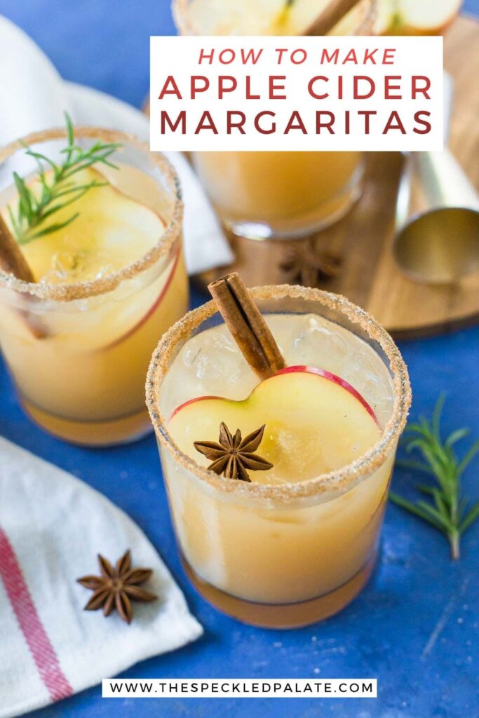 Three Apple Cider Margaritas sit on a blue background with the text 'how to make apple cider margaritas'