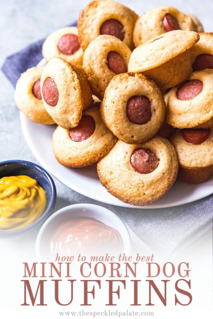 A plate of Mini Corn Dog Muffins with bowls of ketchup and mustard with the text 'how to make the best mini corn dog muffins'