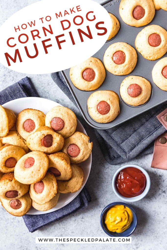 Overhead of a plate of Mini Corn Dog Muffins and a muffin tin holding more next to bowls of ketchup and mustard with the text 'how to make corn dog muffins'