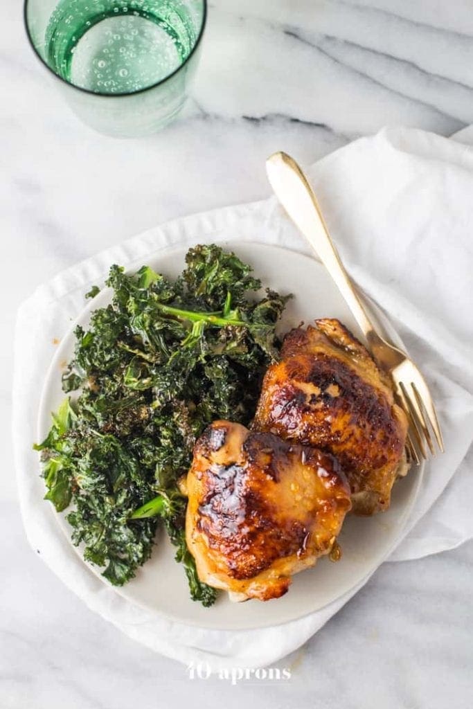 Healthy Honey Garlic Chicken Thighs with Crispy Kale (Paleo)