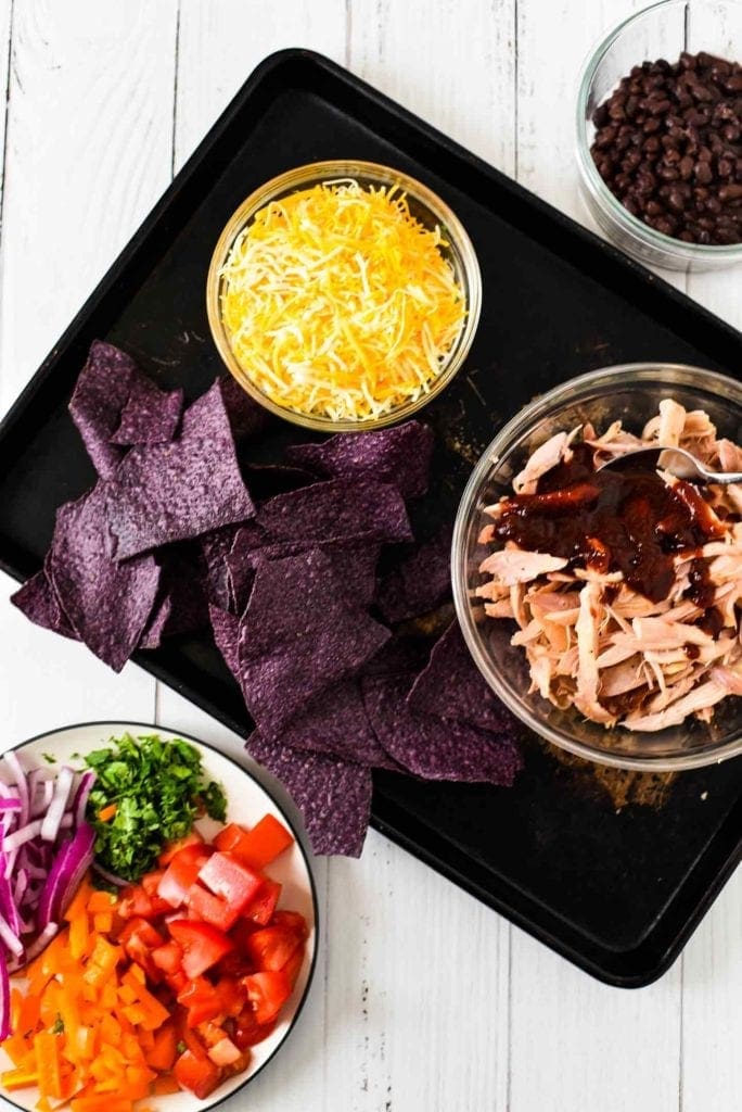 Ingredients for Sheet Pan BBQ Chicken Nachos shown from above