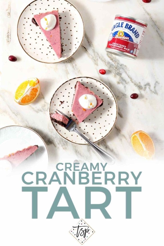 Pinterest image for Creamy Cranberry Tart, featuring text and several slices of the tart with fresh whipped cream