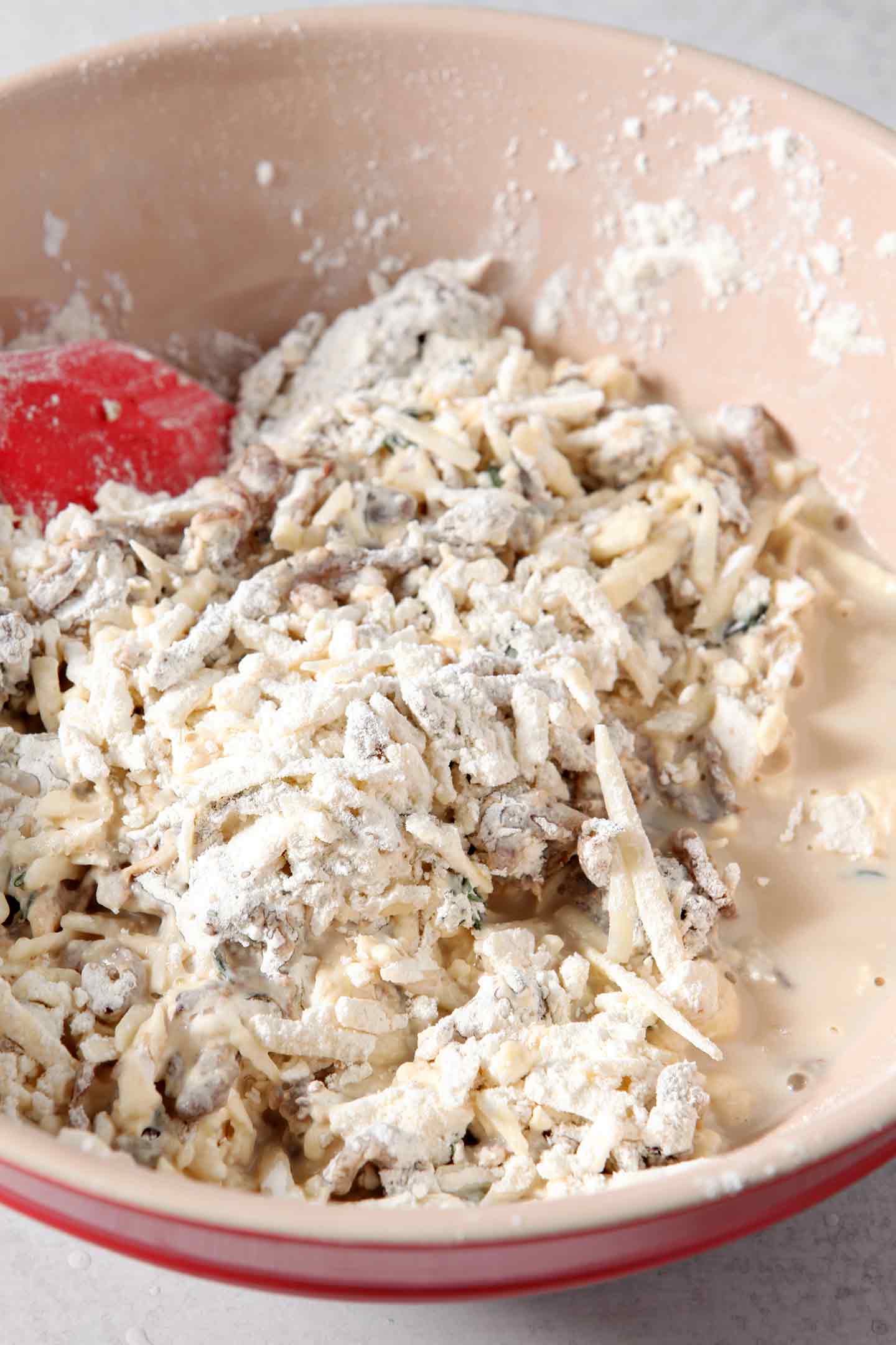 Ingredients for French Onion Biscuits are mixed together in a bowl