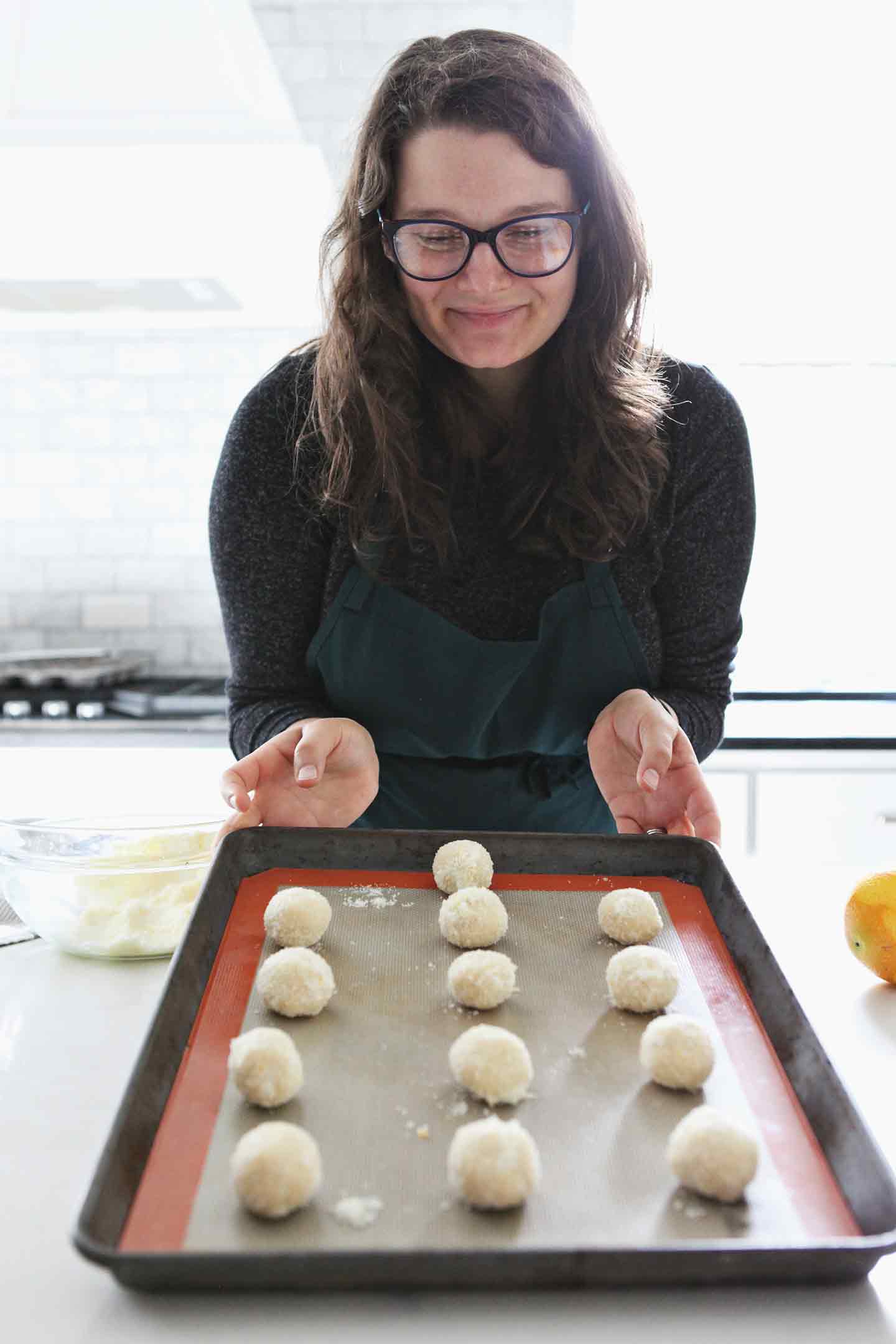 rolling thumbprint cookies into balls