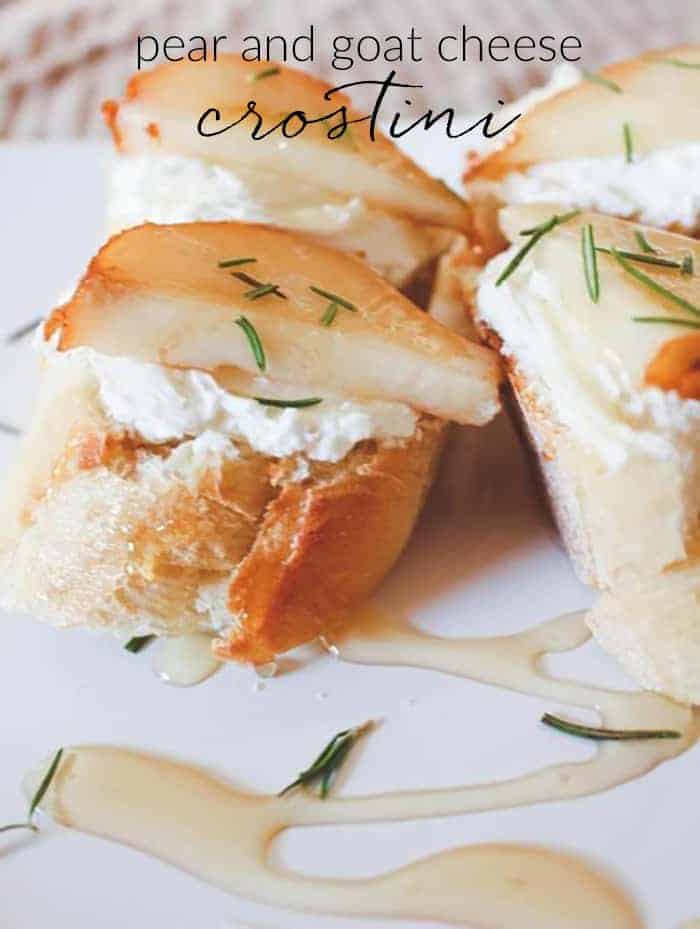 A close up of Pear and Goat Cheese Crostini on a white plate