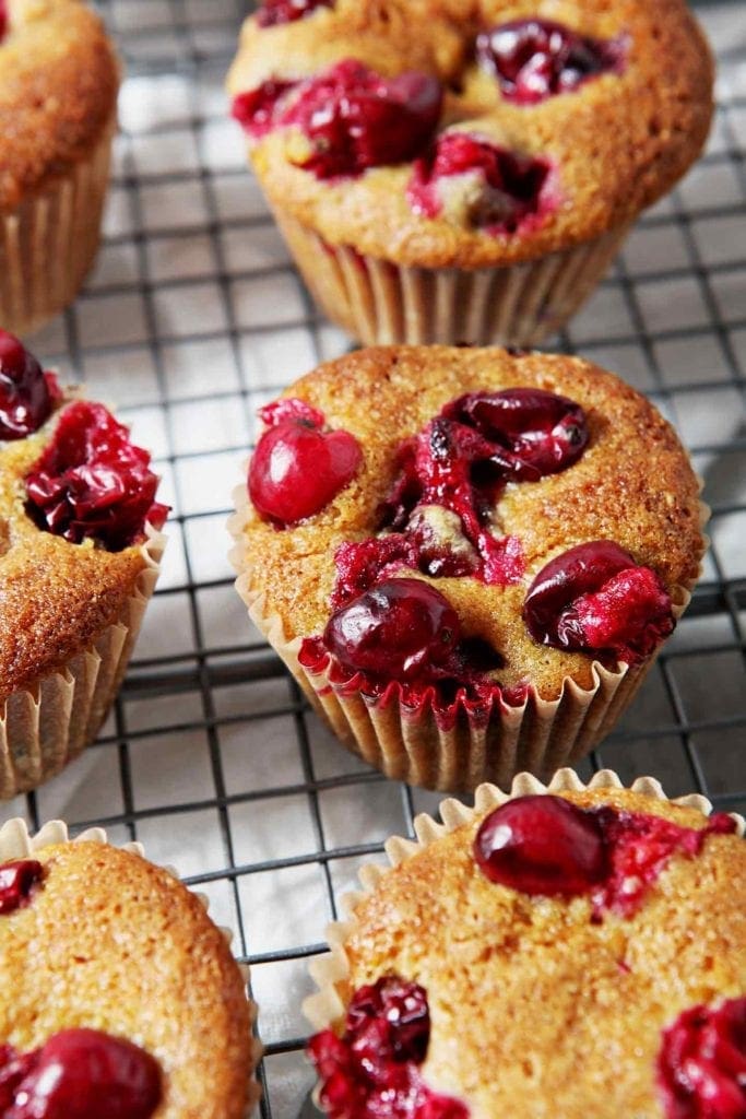 Vegan Orange Cranberry Muffins cool on a wire cooling rack