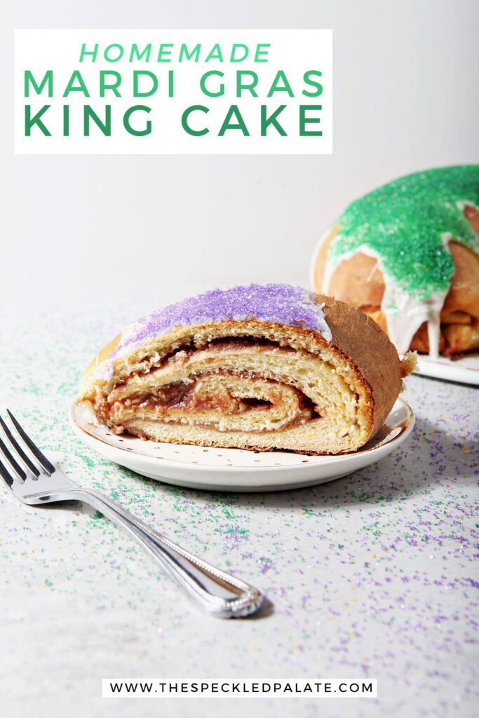 A slice of king cake on a plate with a fork with the text homemade mardi gras king cake