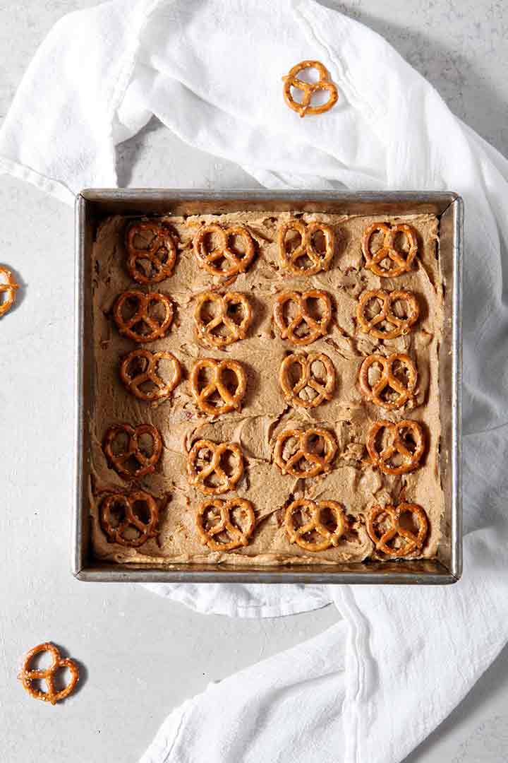 Boozy Bacon Pretzel Peanut Butter Bars in the pan before baking