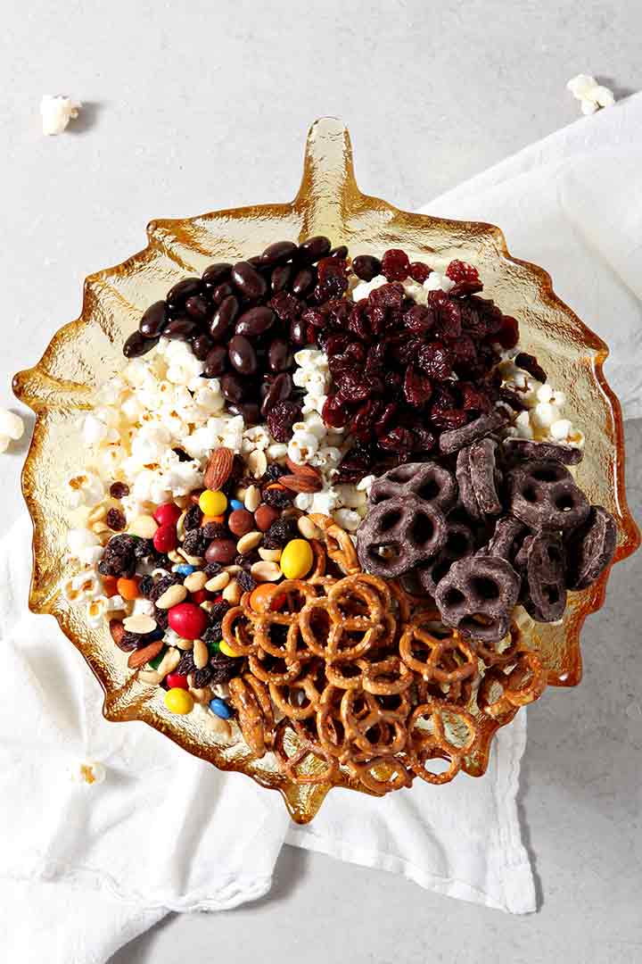 The Sweet-and-Salty Popcorn Mix recipe in a large bowl before mixing