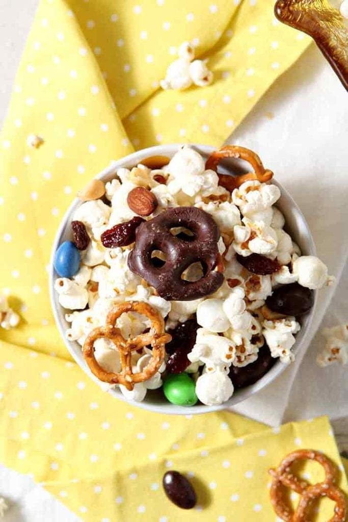 Close up of an individual bowl of the popcorn snack mix