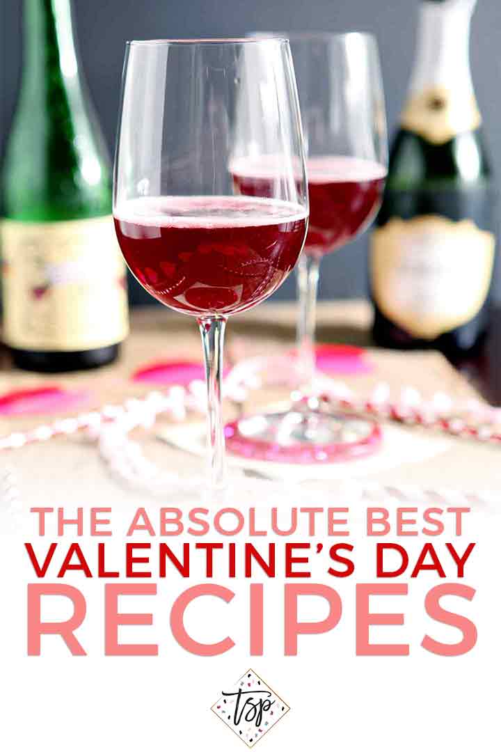 Two drinks are set side by side on a Valentine's Day table with Pinterest text