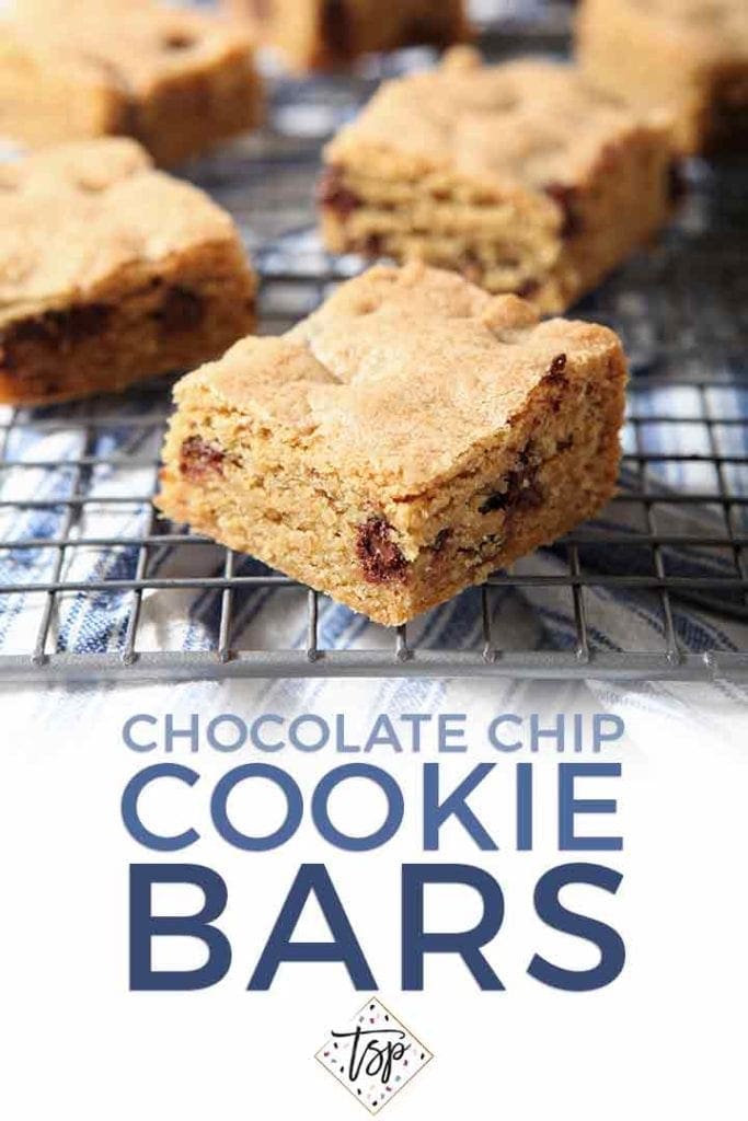 Cookie bars cool on a wire rack with Pinterest text