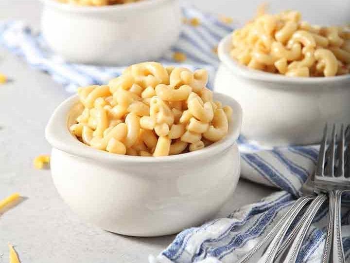 Bowls of Instant Pot Macaroni and Cheese are served