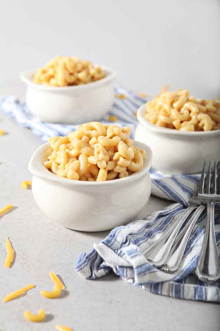 Bowls of Instant Pot Macaroni and Cheese are served