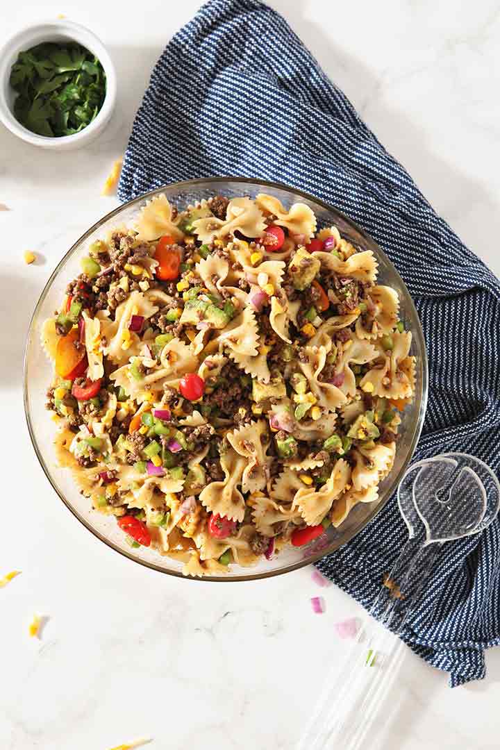 Overhead image of tossed together Beef Taco Pasta Salad