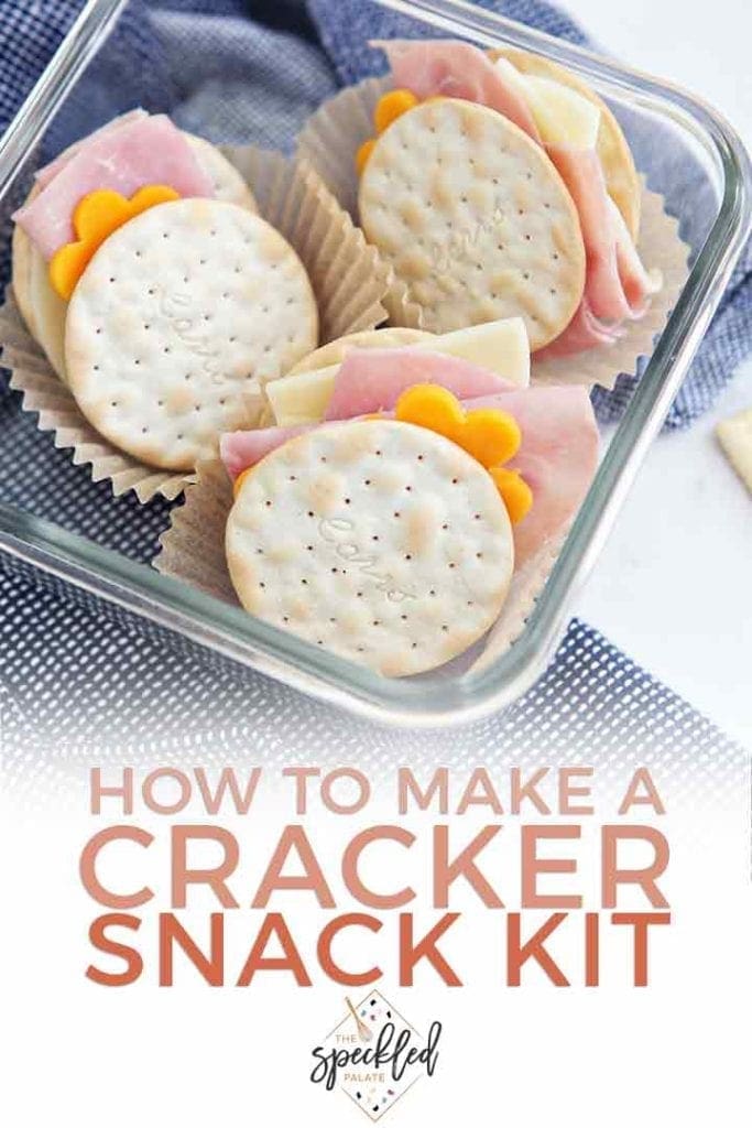 Pinterest graphic featuring a close up of a homemade cracker snack kit and Pinterest text